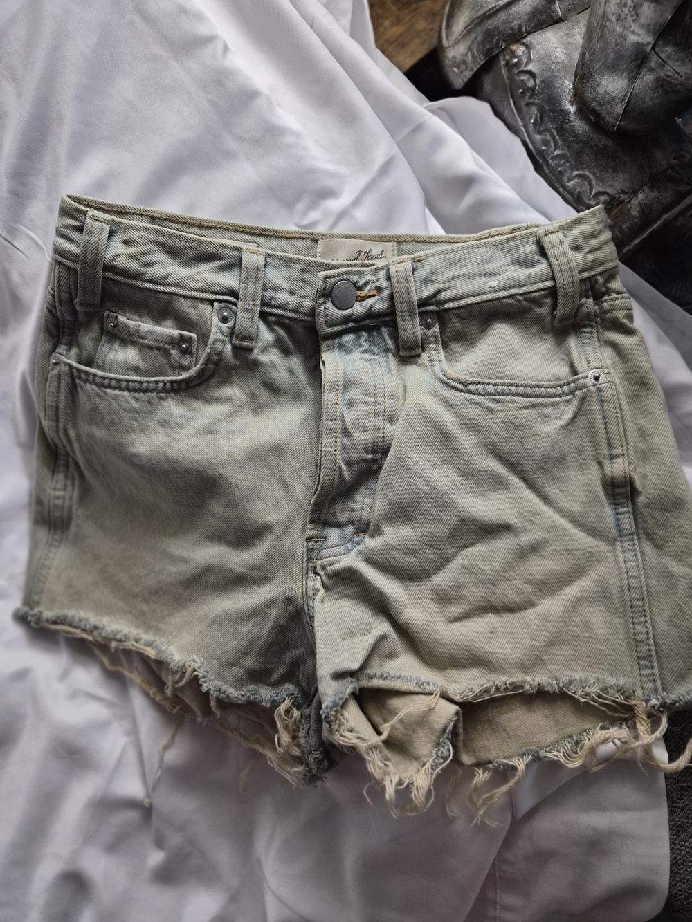 Women’s Distressed Light Blue Denim Shorts